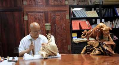 中国著名树雕艺术传承人---李凌云